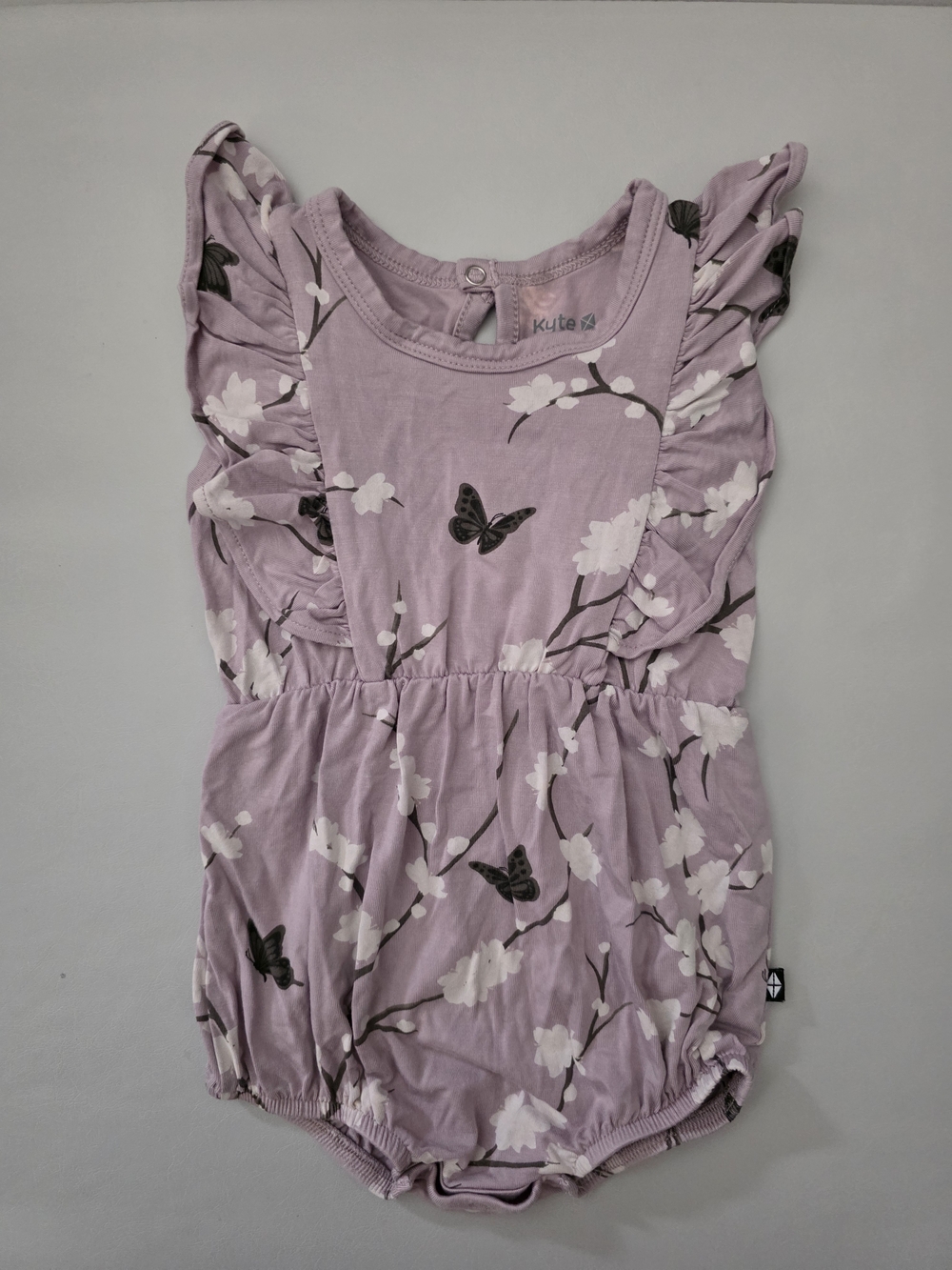 (EUC) Kyte Baby Bubble Romper in Cherry Blossom Size 6-12M